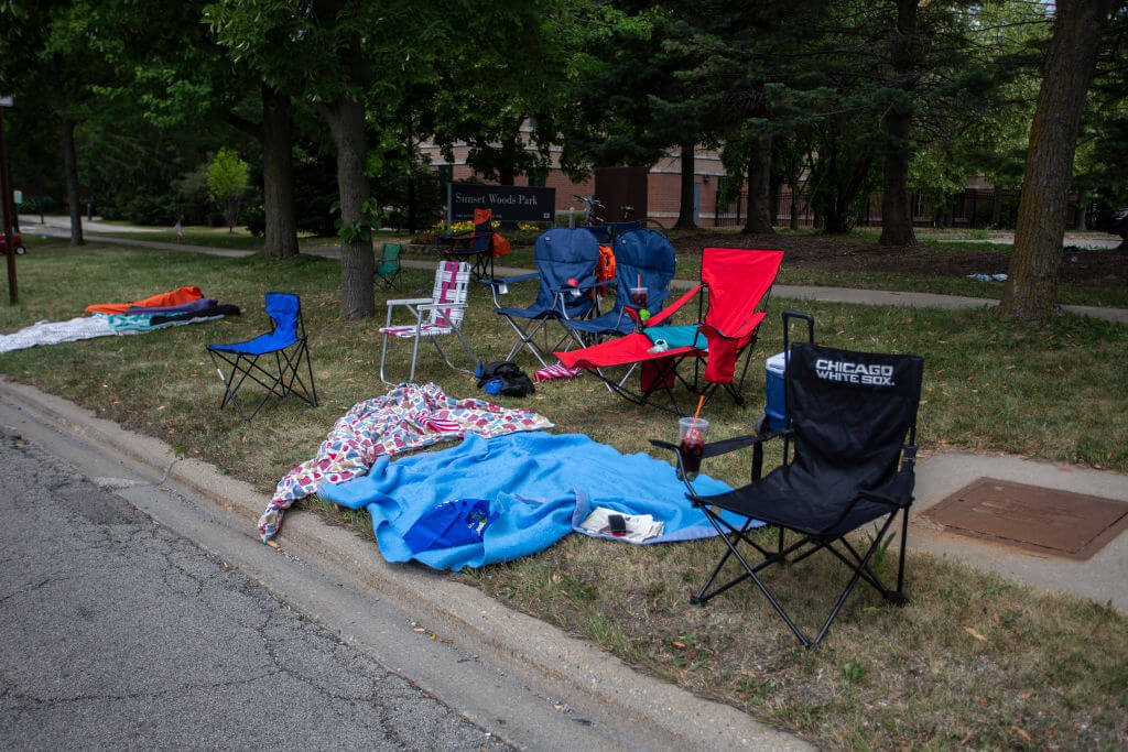 Abandoned chairs and blankets after a shooting at a Fourth of July parade on July 4, 2022 in Highland Park, Illinois. 
