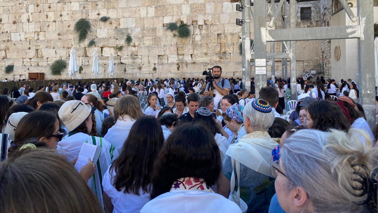 Thousands of protesters gathered around non-Orthodox women, including a bat mitzvah girl and her family, at the Western Wall, July 29, 2022.