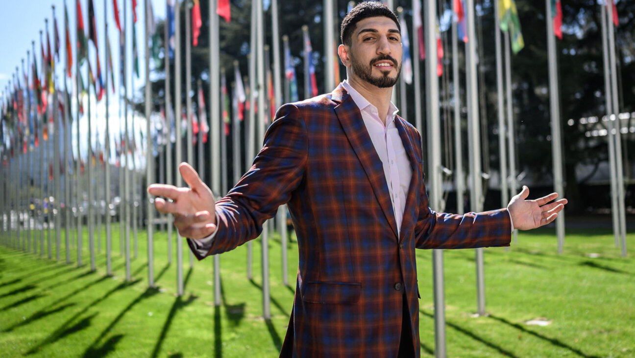 Enes Kanter Freedom poses during an interview  at the United Nations Office in Geneva, April 5, 2022.
