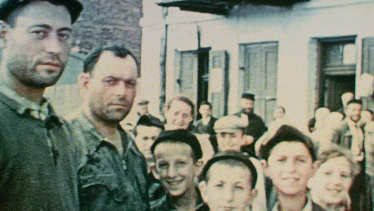 Townspeople shown in the predominantly Jewish village of Nasielsk, Poland, in 1938, as seen in Bianca Stigter’s “Three Minutes: A Lengthening.” (Courtesy of Family Affair Films/US Holocaust Memorial Museum)