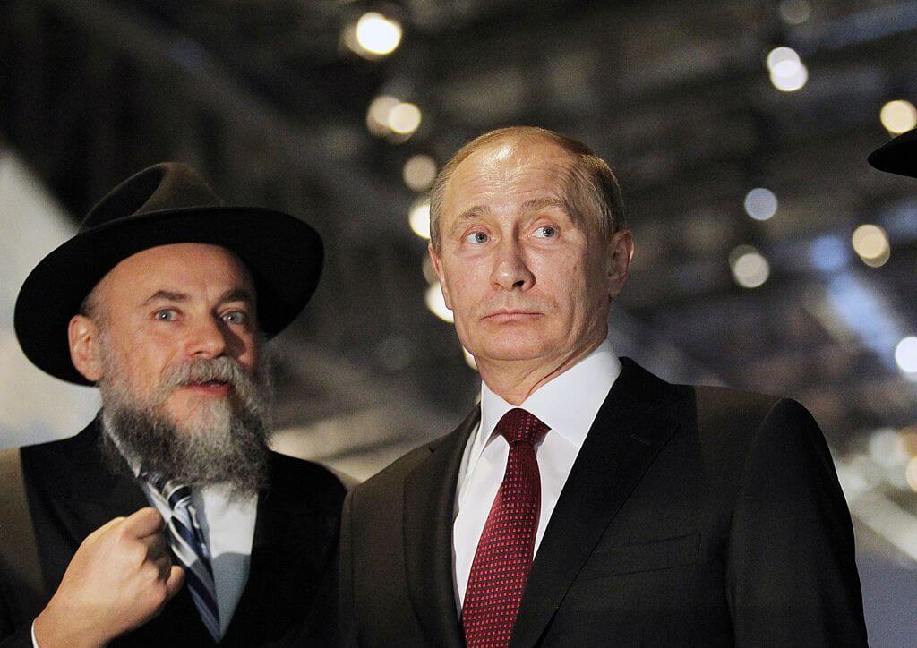 Chairman of the Federation of Jewish Communities in Russia Alexander Boroda (L) with Vladimir Putin at the Jewish Museum and Tolerance Center in Moscow in 2013.