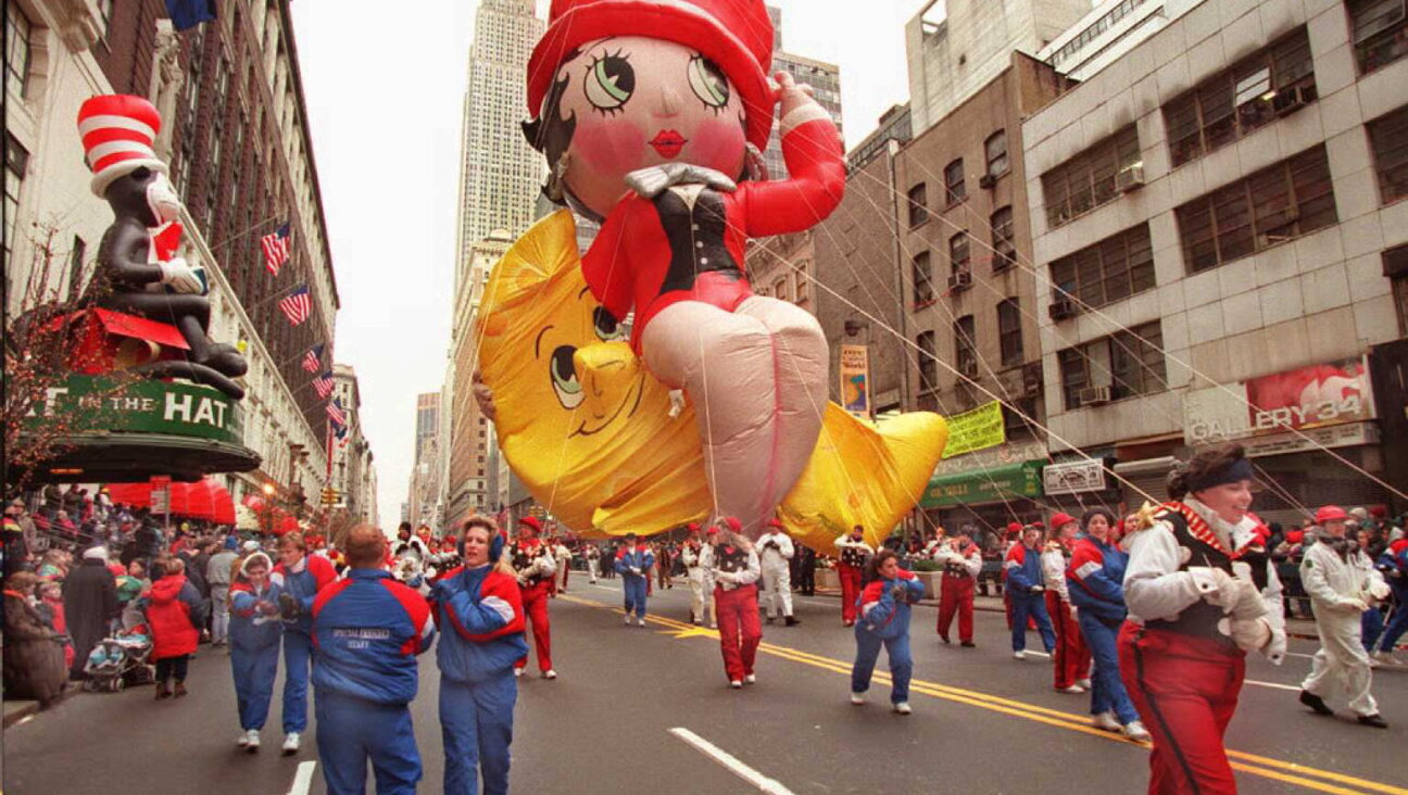 Betty Boop balloon flies past Macy's during the 1995 Thanksgiving Day parade.