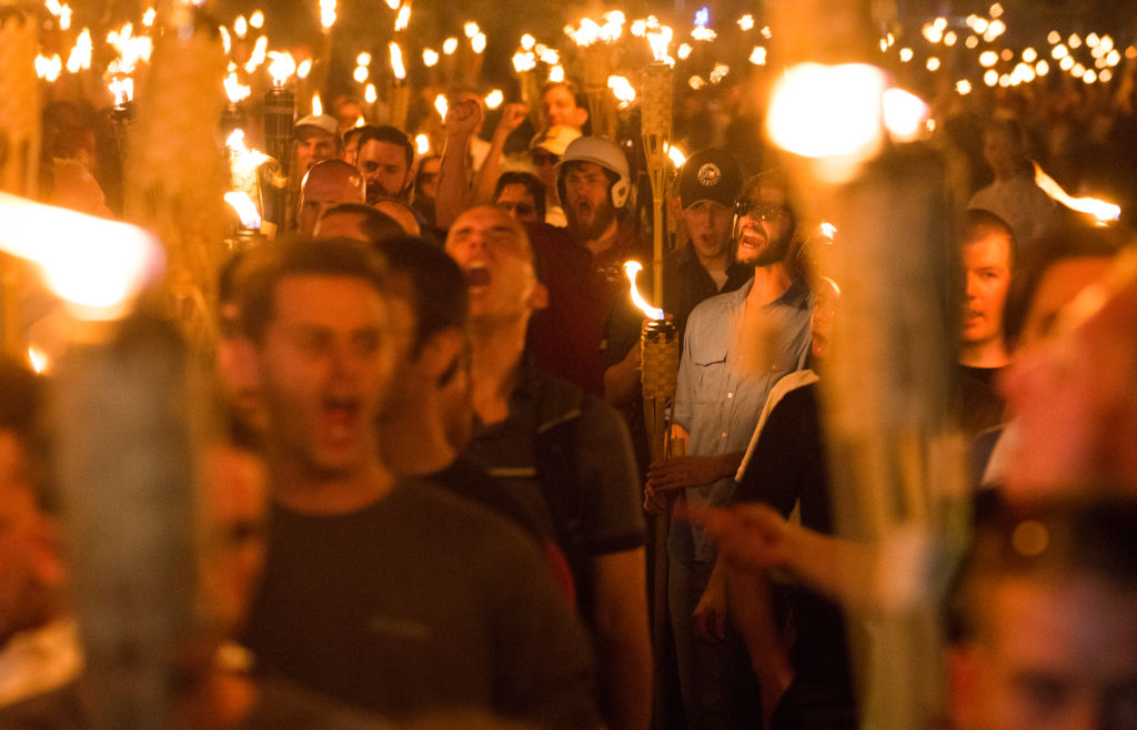 Marchers with tiki torches at the ‘Unite the Right’ rally in Charlottesville, Va. (Getty)