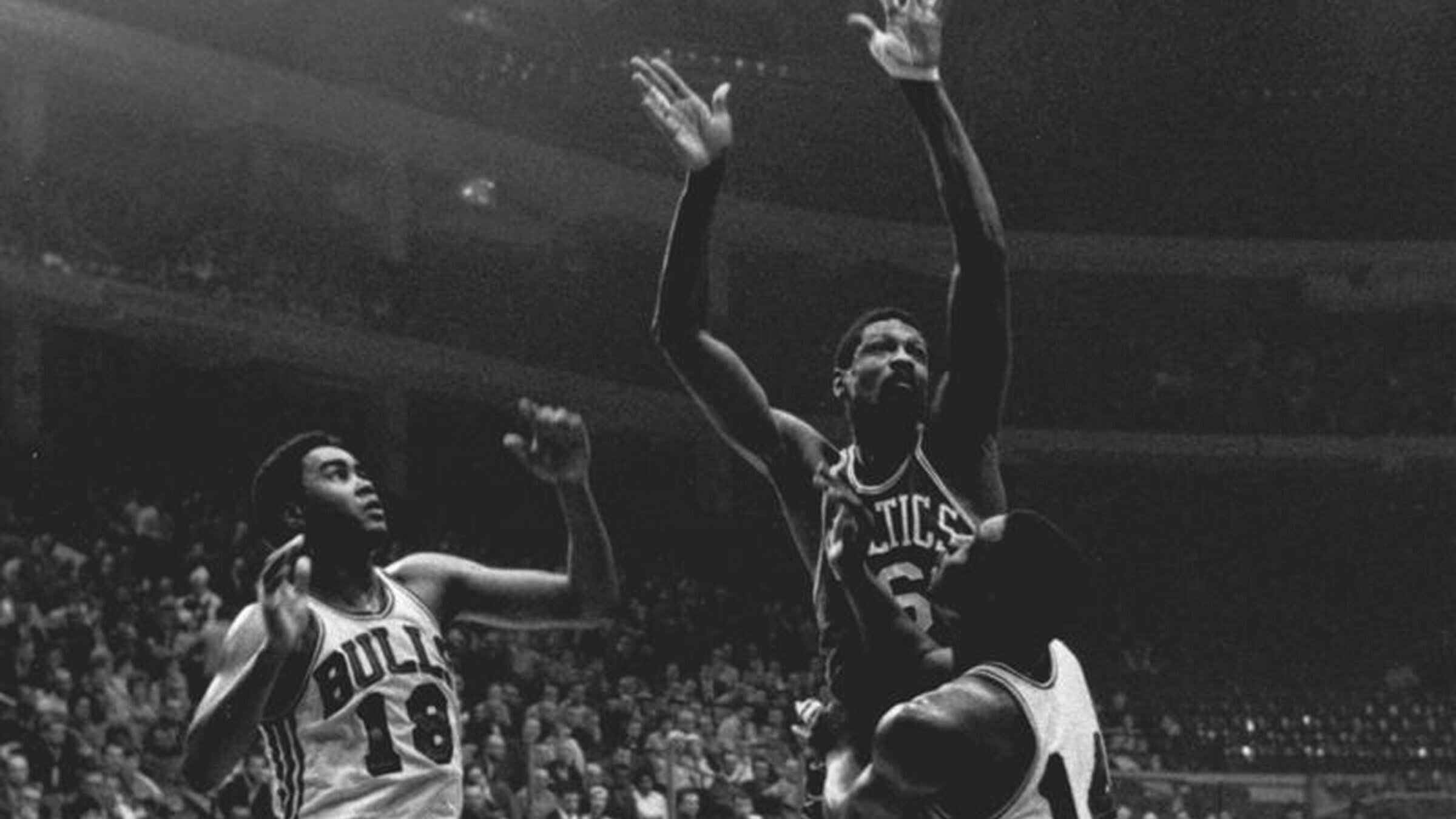 Boston Celtics center Bill Russell takes on the Chicago Bulls in 1967.