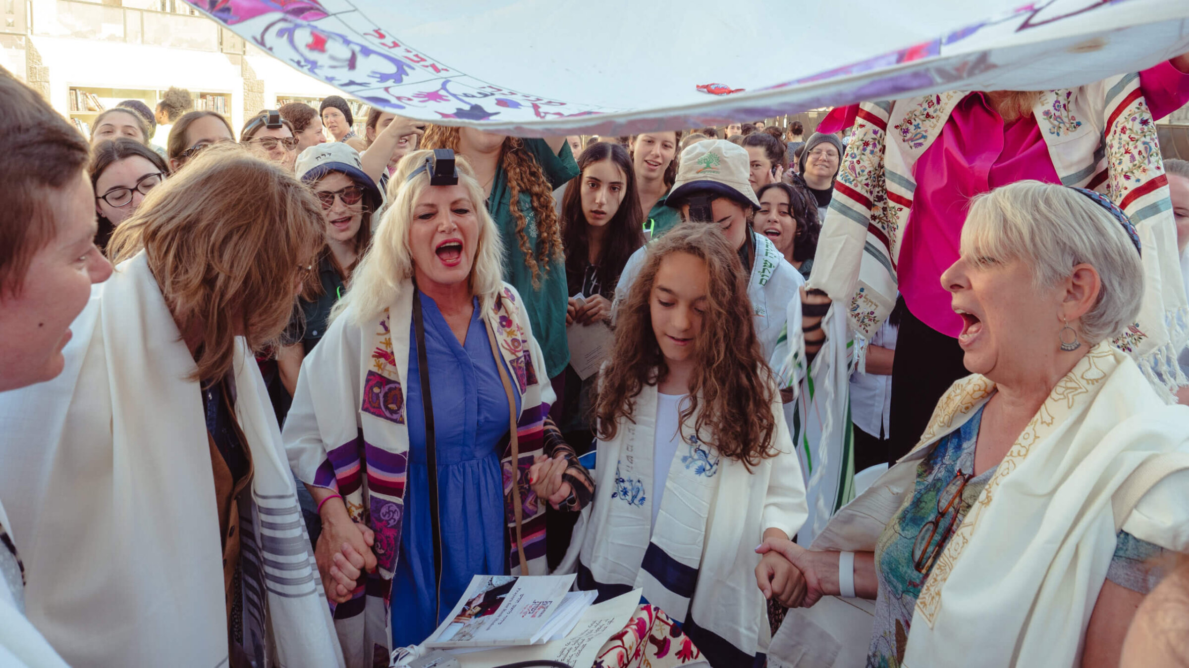 Lucia da Silva, center, prays with Women of the Wall during her bat mitzvah ceremony.