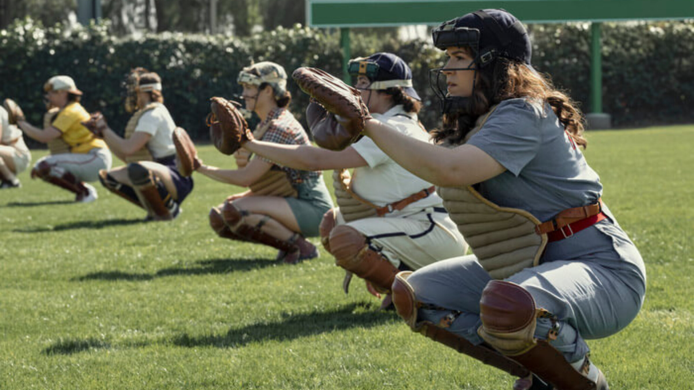 Abbi Jacobson (R) plays Carson, an awkward catcher from Idaho in the new series "A League of Their Own." 