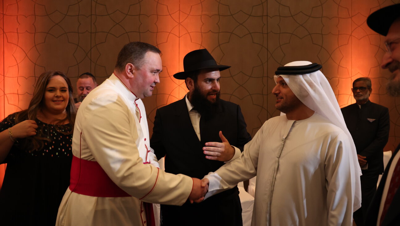 UAE Rabbi Levi Duchman, center, greets guests during his wedding on Sept. 14, 2022.