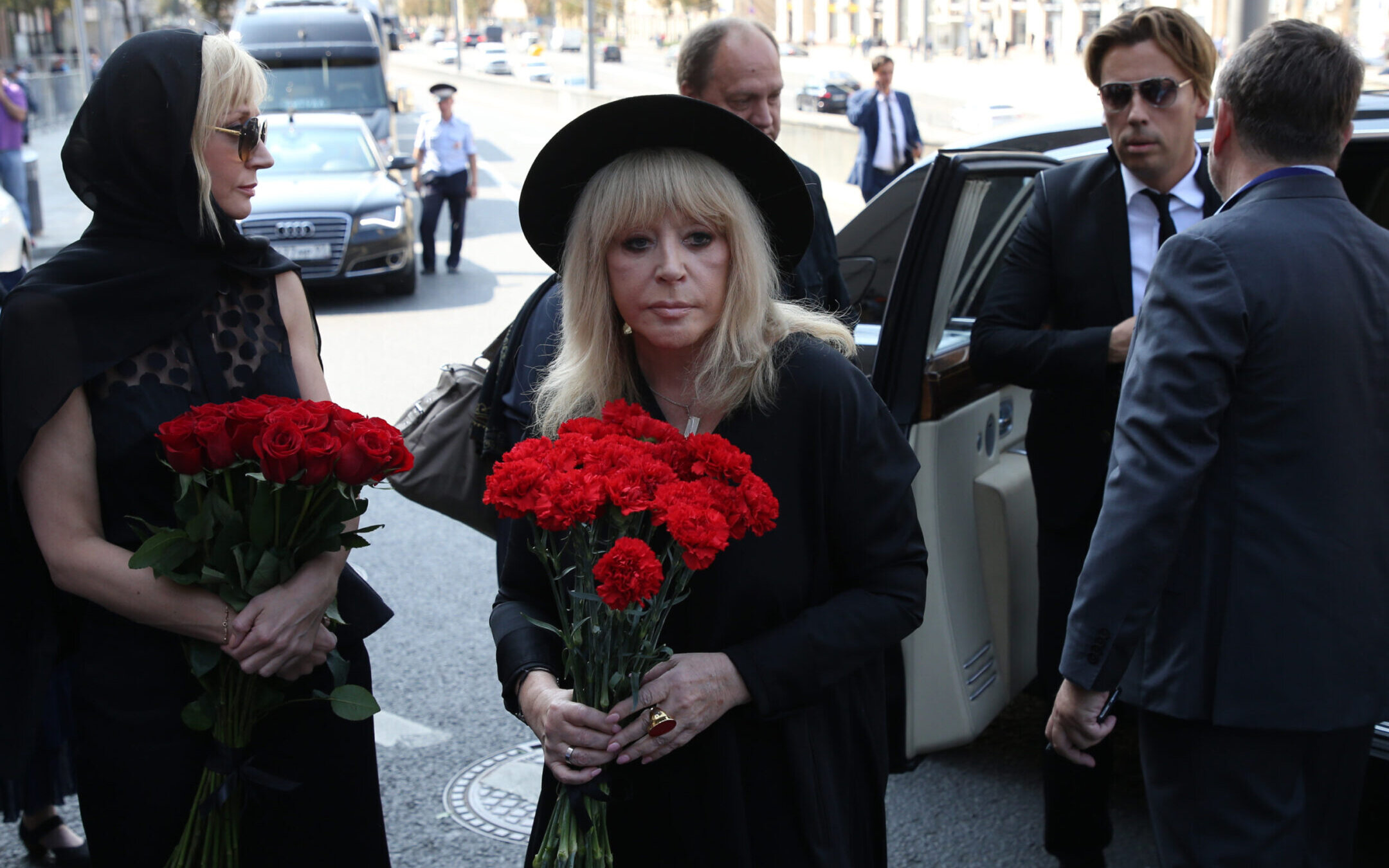 Russian pop star Alla Pugacheva and her husband Maksim Galkin, at right, arrive for the funeral of Russian singer and State Duma Deputy Joseph Kobzon in Moscow, Sept. 2, 2018.(Mikhail Svetlov/Getty Images)