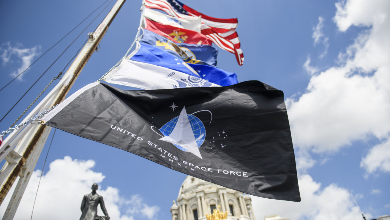 A Space Force flag, waving proudly for "warfighters brave and true."