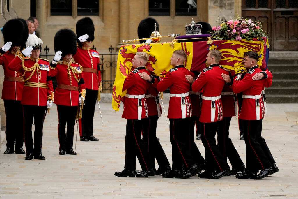 The coffin of Queen Elizabeth II is carried into Westminster Abbey in London.