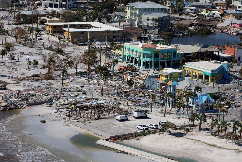  In an aerial view, damaged buildings are seen as Hurricane Ian passed through the area on September 29, 2022 in Fort Myers Beach, Florida. The hurricane brought high winds, storm surge and rain to the area causing severe damage. 
