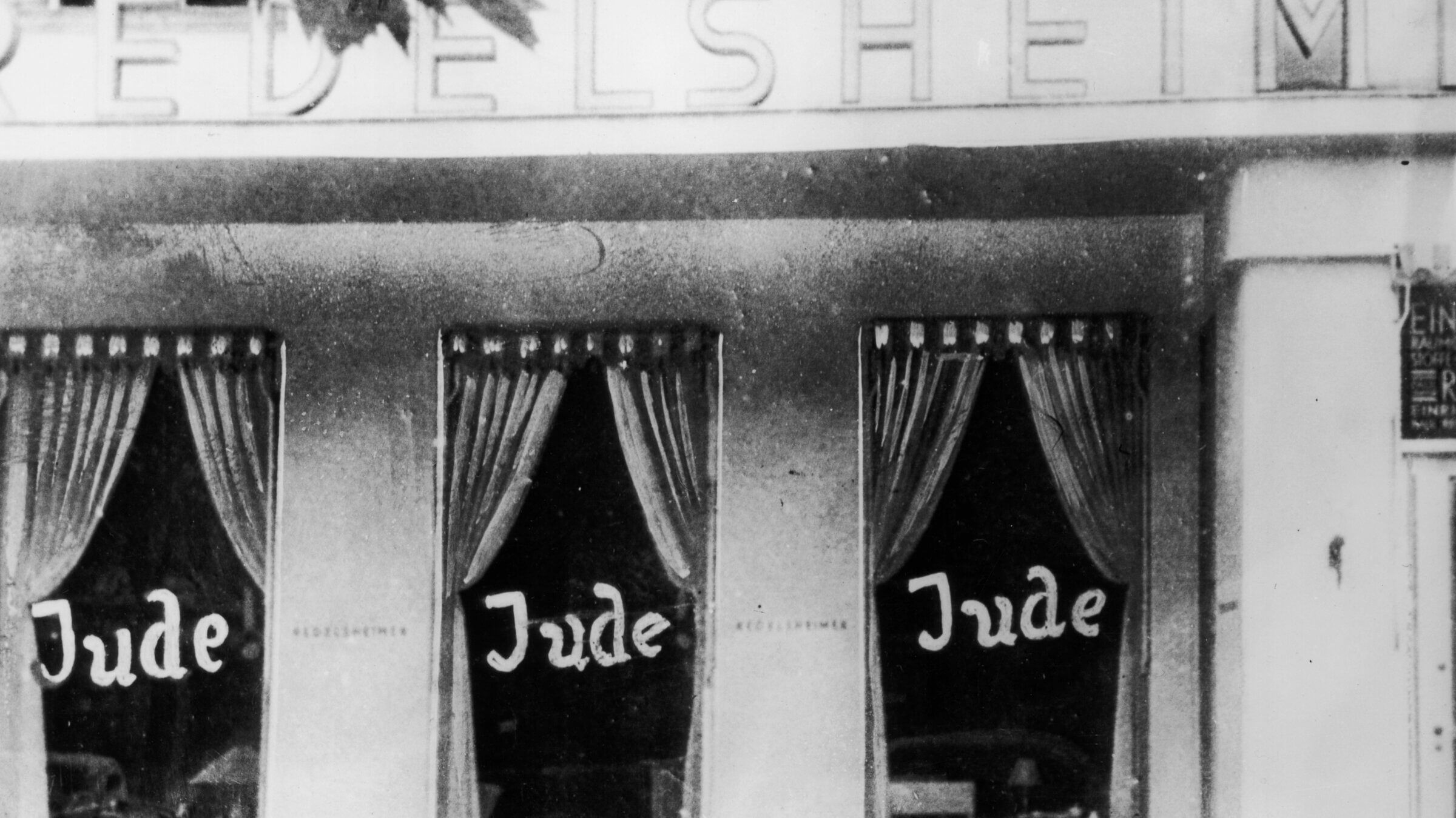 Windows of a Jewish-owned shop in Berlin, 1938.