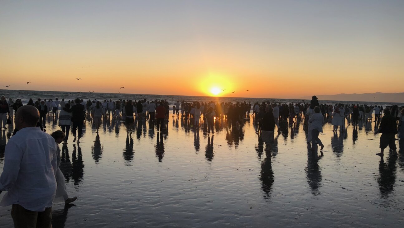 Congregants of Nashuva cast bread into the waters of Santa Monica Bay during the Rosh Hashanah tashlich ritual in 2021.