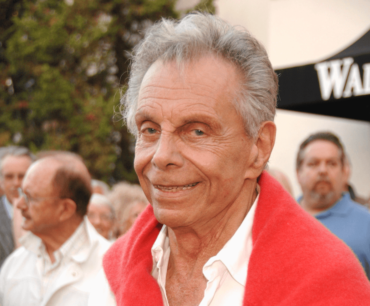 The late Mort Sahl should host "The Daily Show." Let me explain how.