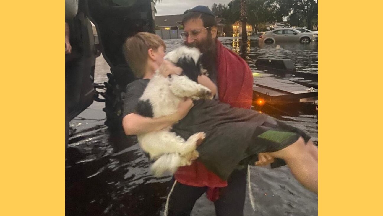 Rabbi Yosef Konikov of Chabad of South Orlando helped deliver supplies and rescue a family left stranded in the wake of Hurricane Ian.