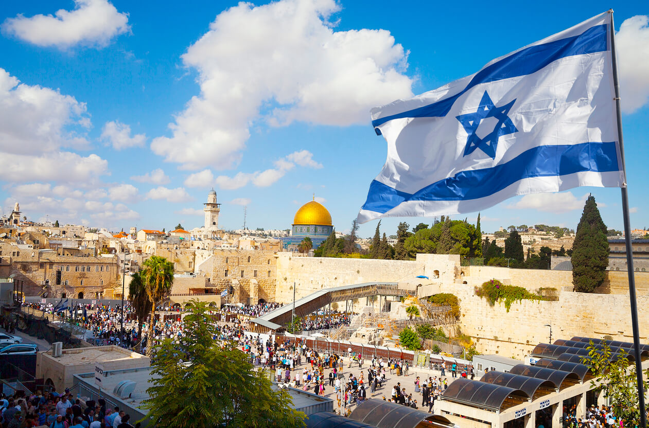 The Israeli flag overlooking the Western Wall Square in Jerusalem.