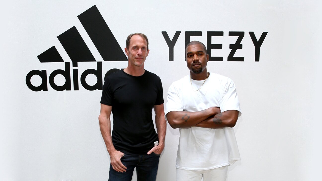 Former Adidas CMO Eric Liedtke, left, and Kanye West, right, at Milk Studios in Hollywood, June 28, 2016.