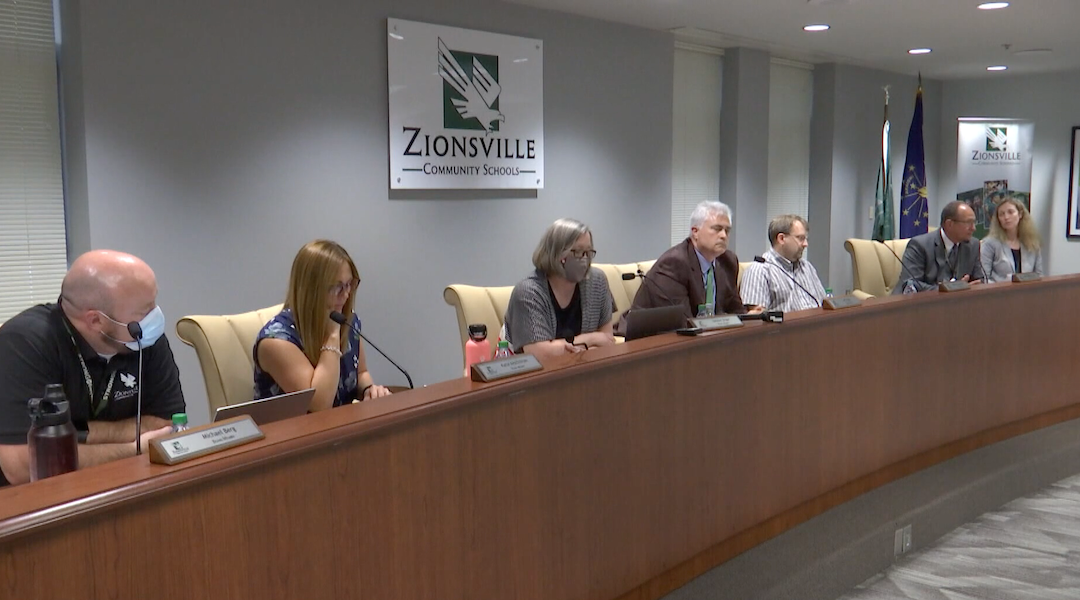 Members of the Zionsville, Indiana, school board shown at a recent meeting. (Screenshot from WTHR)