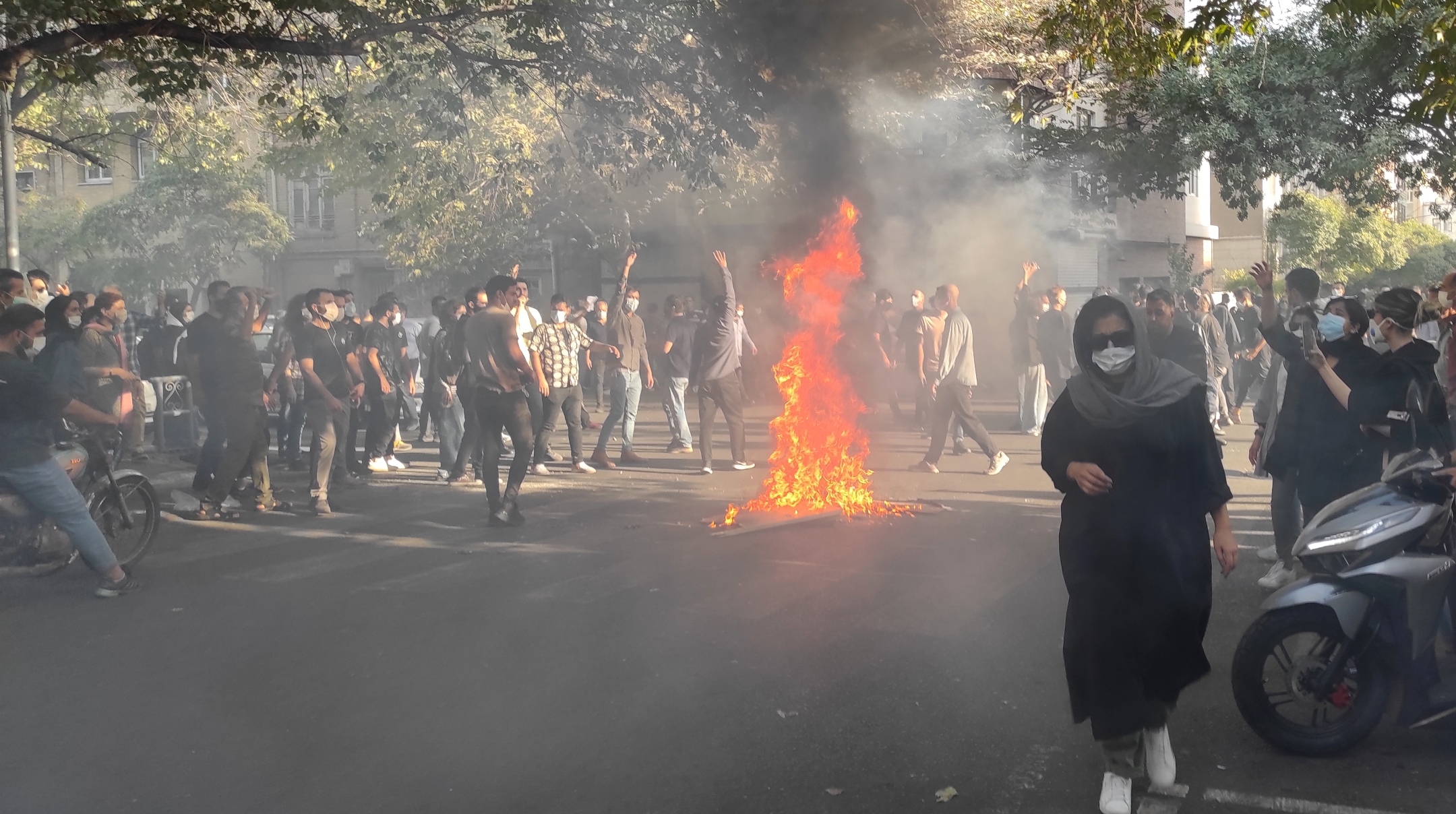 Iranian protesters march down a street in Tehran, Oct. 1, 2022. (Getty Images)
