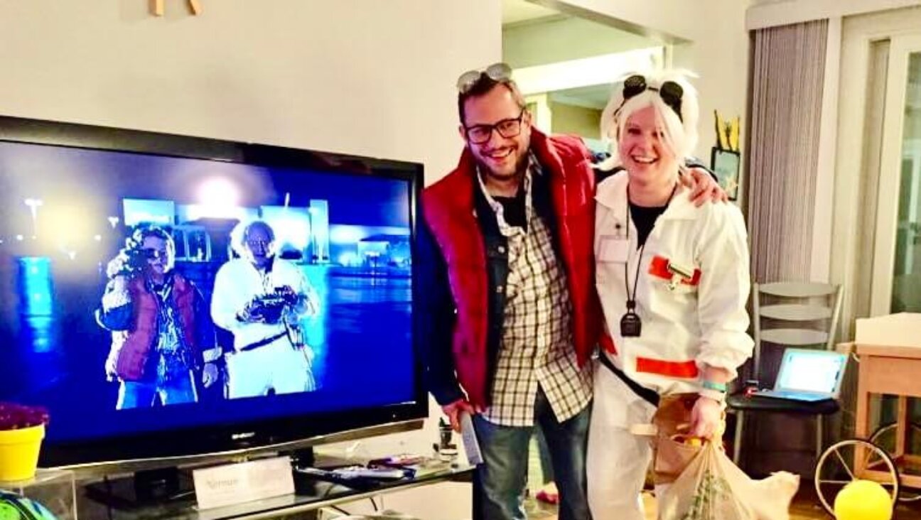 Benyamin and Elizabeth Cohen, in costume as Marty McFly and Doc Brown from 'Back to the Future.'