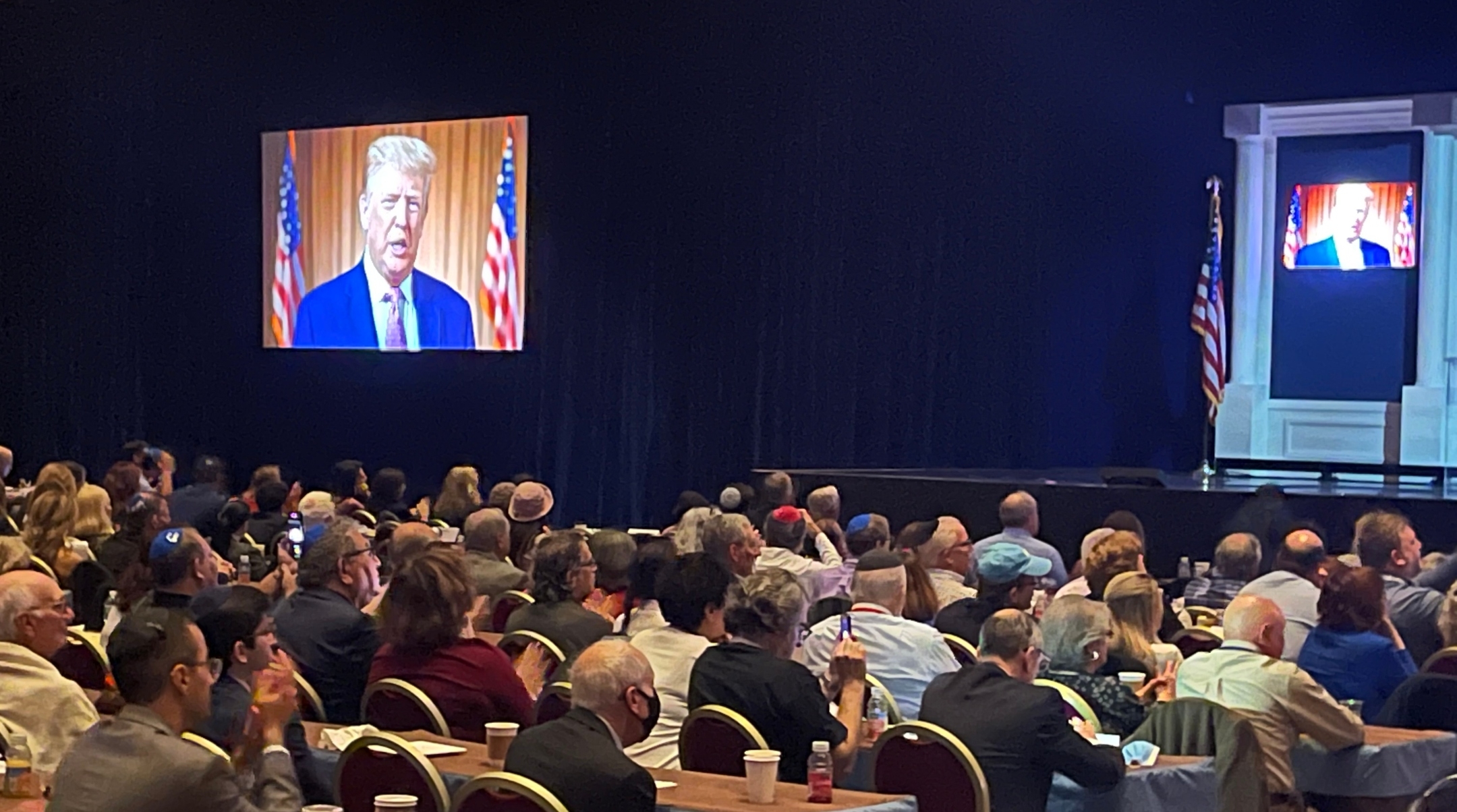 Republican Jewish Coalition members listen to a prerecorded video from Donald Trump, in the Venetian resort in Las Vegas, Nov. 6, 2021. (Ron Kampeas)