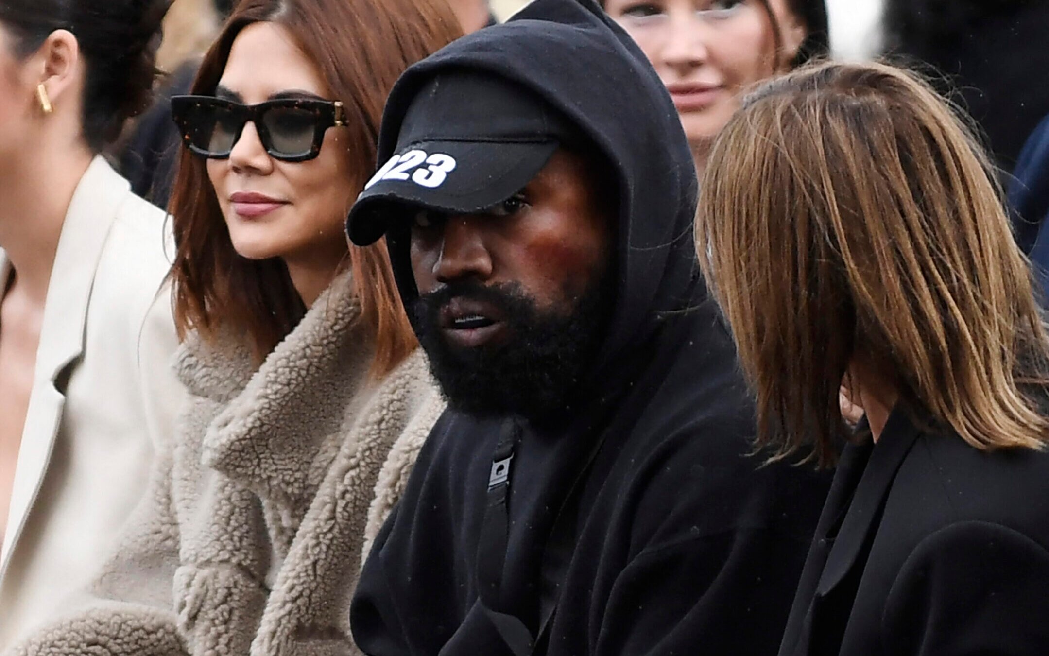 Kanye West attends the Givenchy Spring-Summer 2023 fashion show during the Paris Womenswear Fashion Week, Oct. 2, 2022. 
