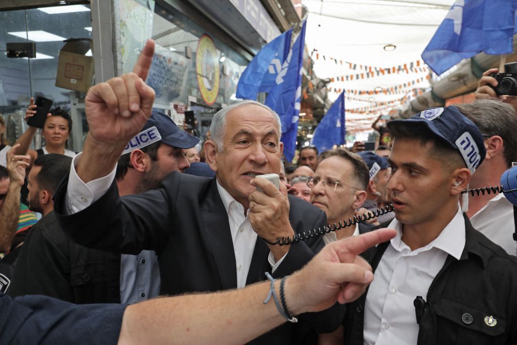 Former Prime Minister Benjamin Netanyahu speaks at a campaign stop on Friday in Tel Aviv. (Getty)
