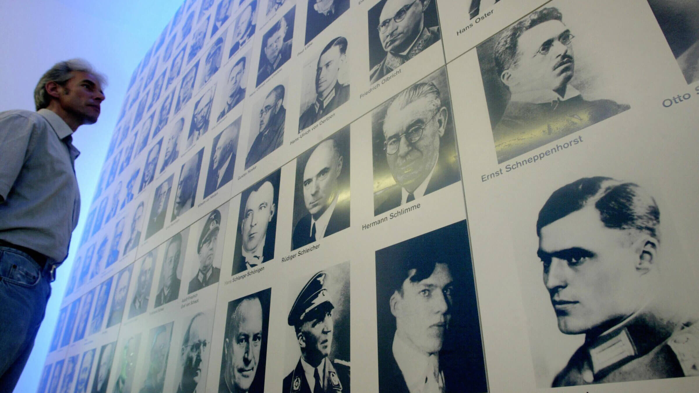 In Berlin, a wall of photos displays members of the resistance who plotted a 1944 assassination attempt against Hitler.