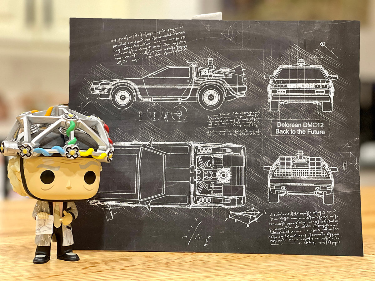 Some 'Back to the Future' knickknacks, including a Doc Brown doll and the schematics to the time traveling DeLorean.
