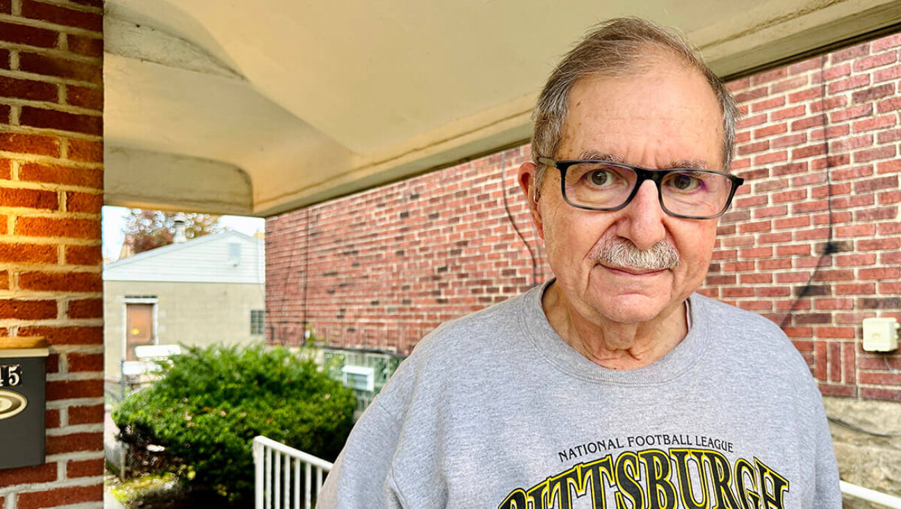 Barry Werber, a survivor of the Tree of Life massacre, on his porch at his home in Pittsburgh.