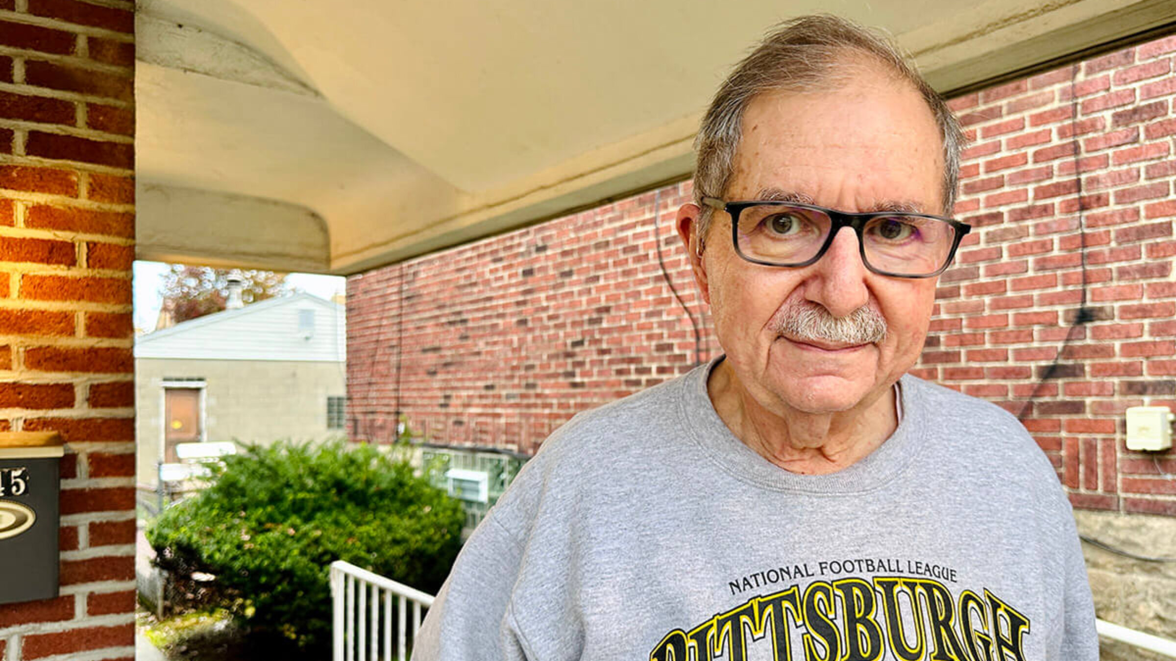 Barry Werber, a survivor of the Tree of Life massacre, on his porch at his home in Pittsburgh.