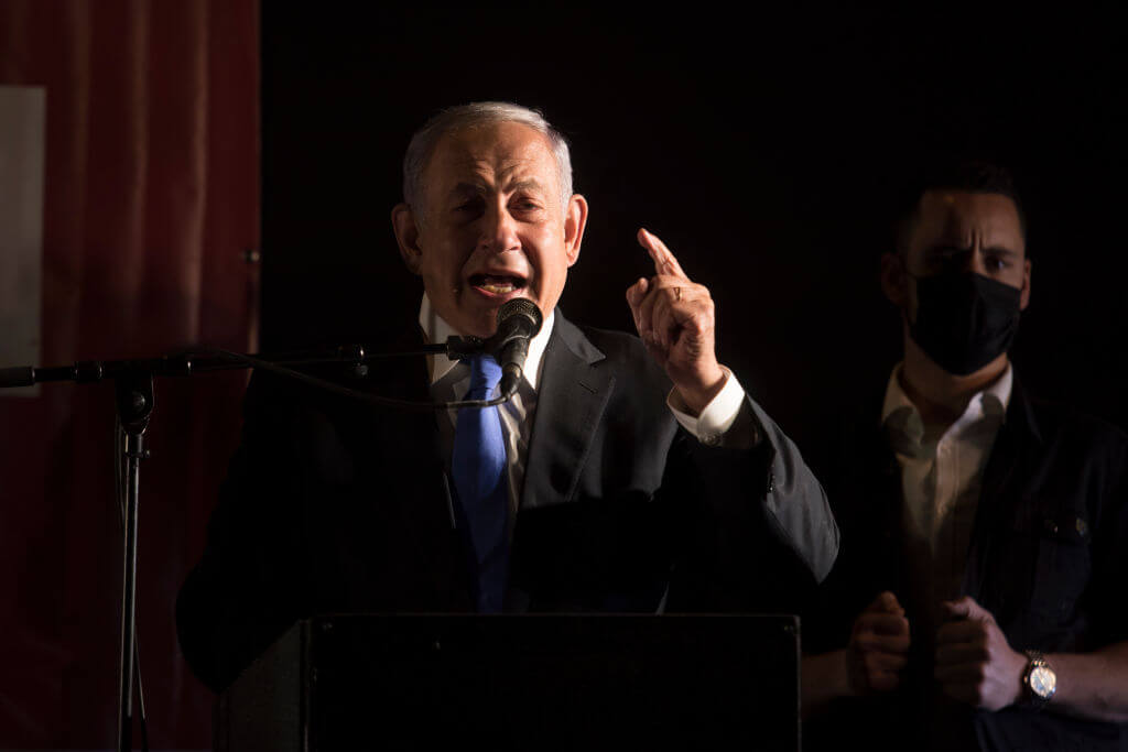Benjamin Netanyahu speaks during a protest against the Israeli government on April 6, 2022. (Amir Levy/Getty Images)
