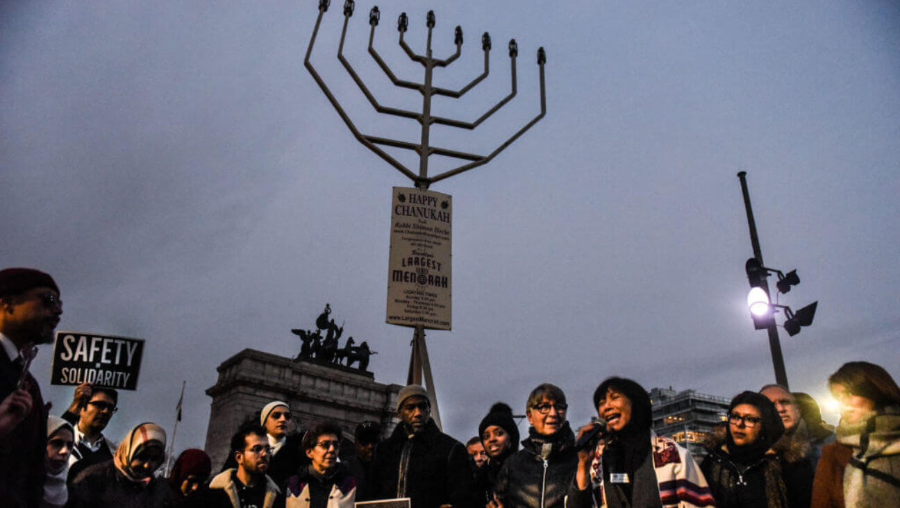 A rabbi delivers remarks during a rally in support of the Jewish community amidst recent antisemitic attacks on Dec. 31, 2019, in the Brooklyn borough of New York City. 