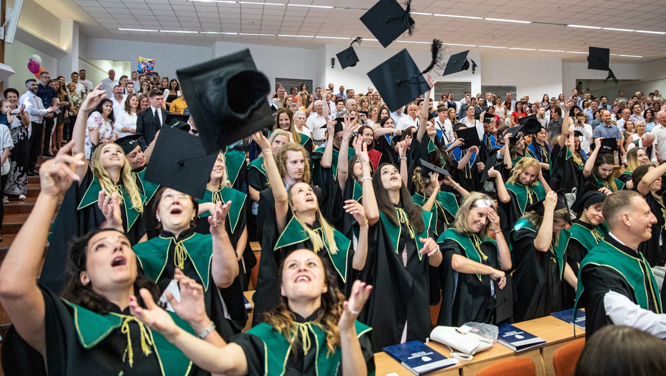 Students and faculty attend a graduation ceremony at Milton Friedman University in Budapest, Hungary, July 23, 2019. (courtesy of Milton Freidman University)