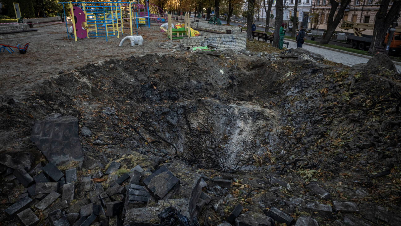 A playground stands near where a Russian missile struck Kyiv on Monday, Oct. 10, 2022, a few blocks from the author's apartment.