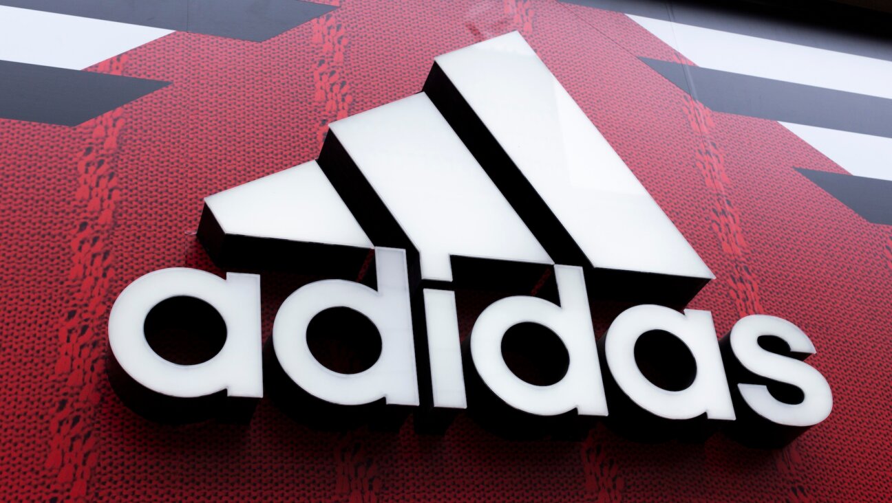 The Adidas logo is pictured on a building in Manchester, England, July 14, 2022. (Daniel Harvey Gonzalez/In Pictures via Getty Images)
