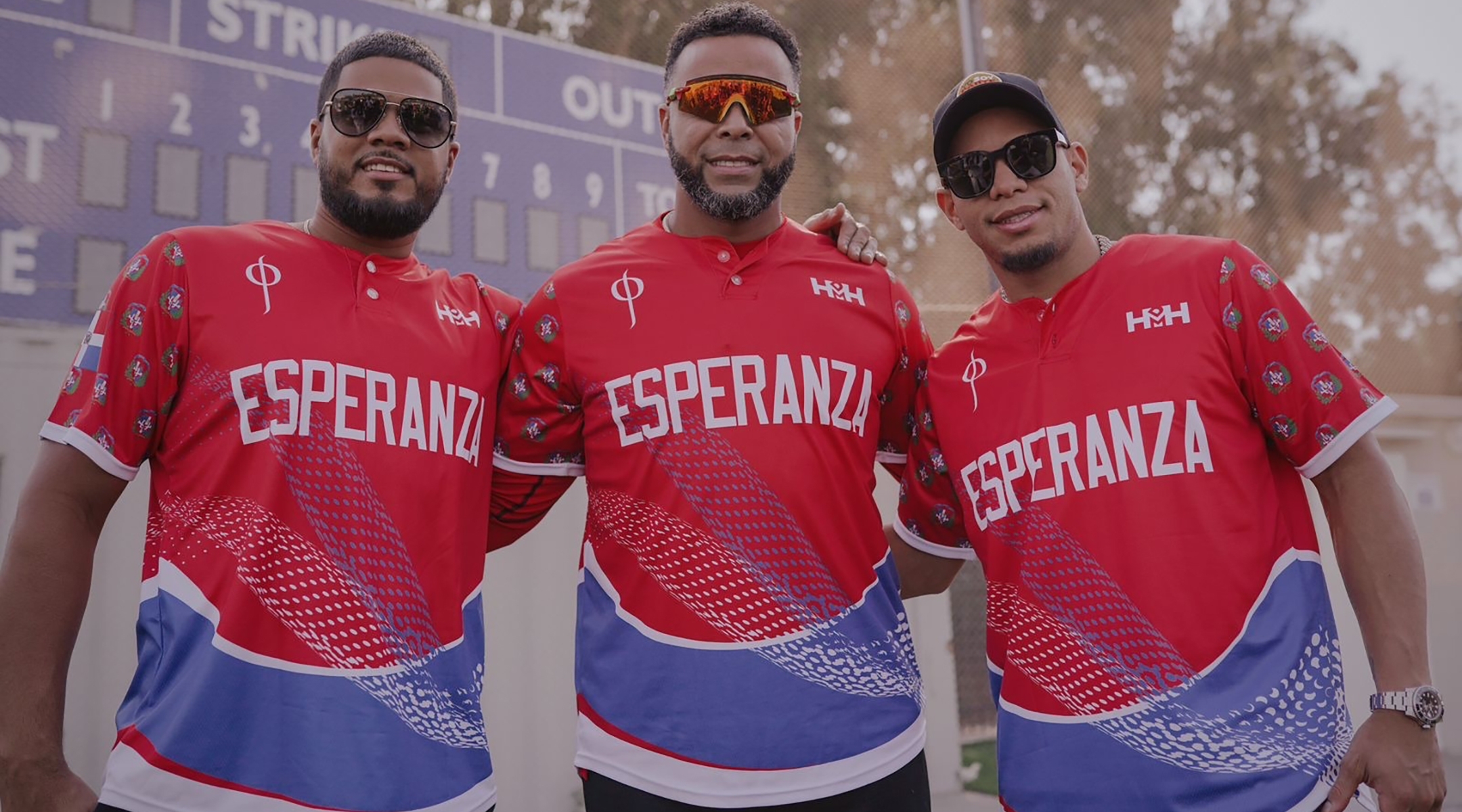 From left, Jeimer Candelario, Nelson Cruz and Cesar Hernandez pose for a photo at a baseball field in Raanana, Israel. (Nico Andre’ Duran)