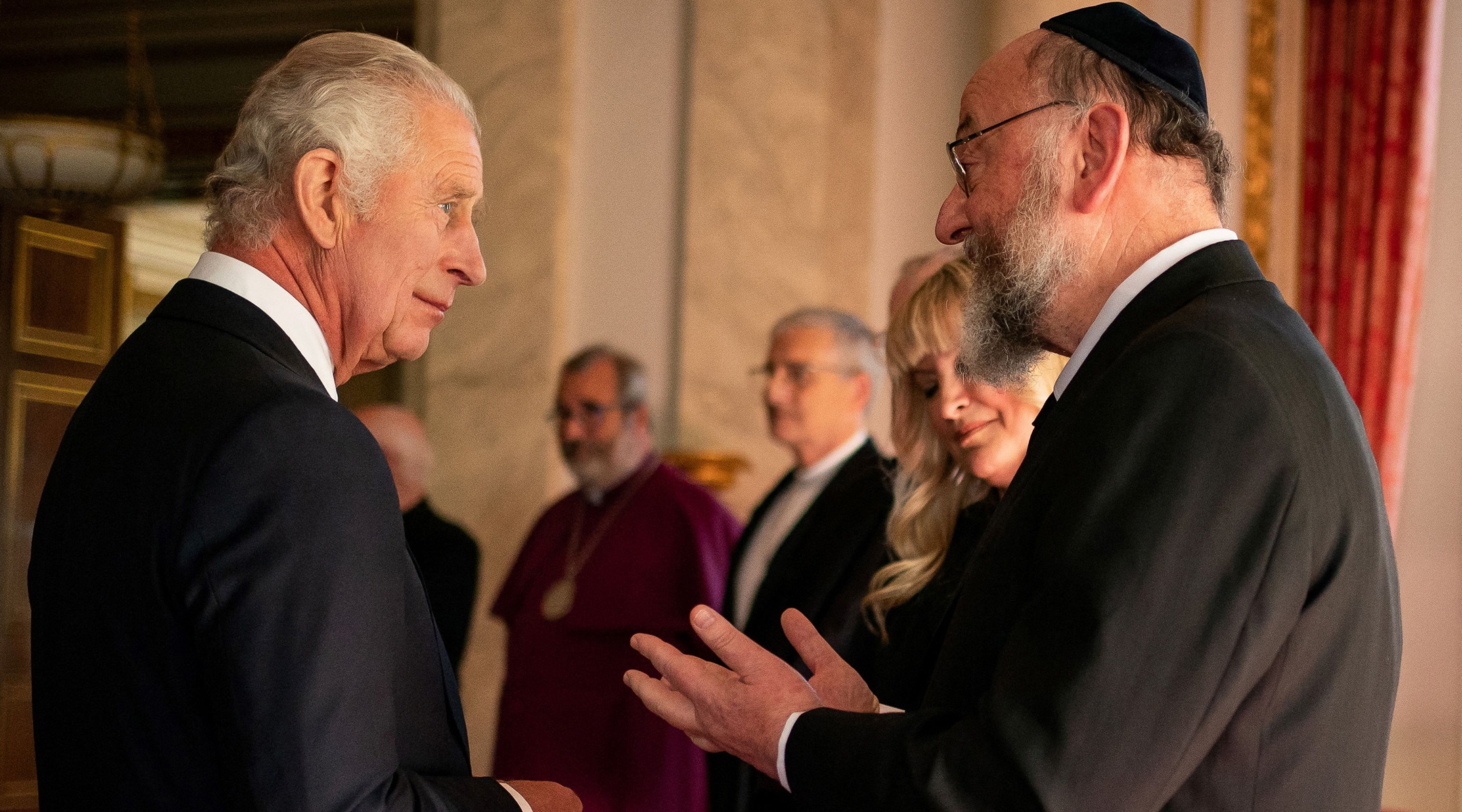 King Charles III meets Chief Rabbi Ephraim Mirvis during a reception with faith leaders at Buckingham Palace in London, Sept. 16, 2022. (Aaron Chown/Pool/AFP via Getty Images)