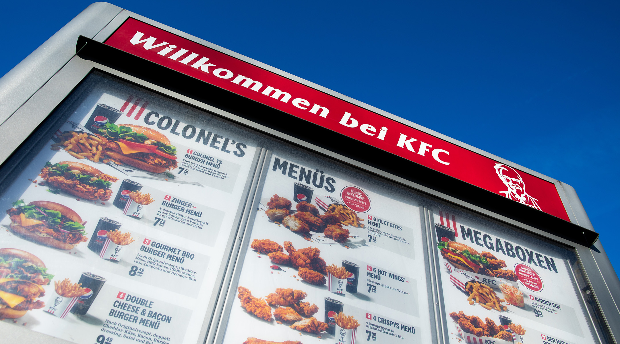 “Welcome to KFC” is written above a drive-in menu at the fast food chain Kentucky Fried Chicken (KFC) in Duesseldorf, Nov. 18, 2020. (Rolf Vennenbernd/picture alliance via Getty Images)