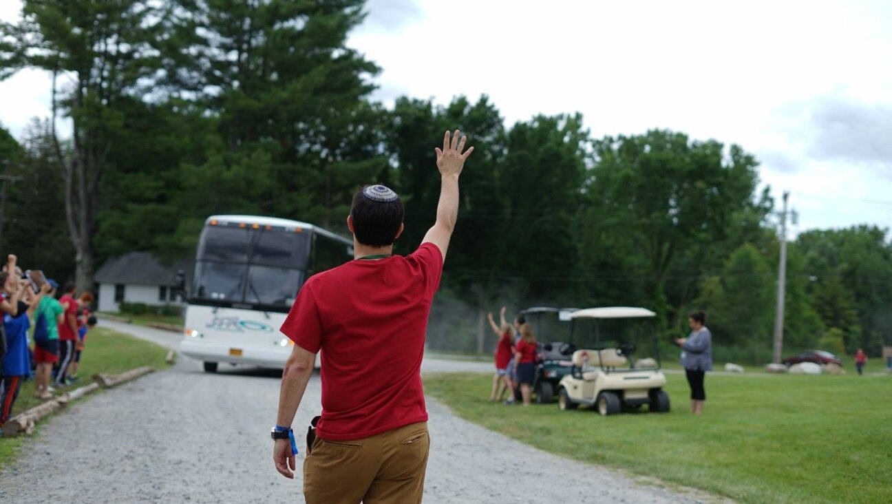 Rabbi Ethan Linden, pictured here welcoming campers to Ramah Berkshires in 2017, resigned as camp director before the institution settled a lawsuit alleging Linden and others mishandled a sexual assault report.