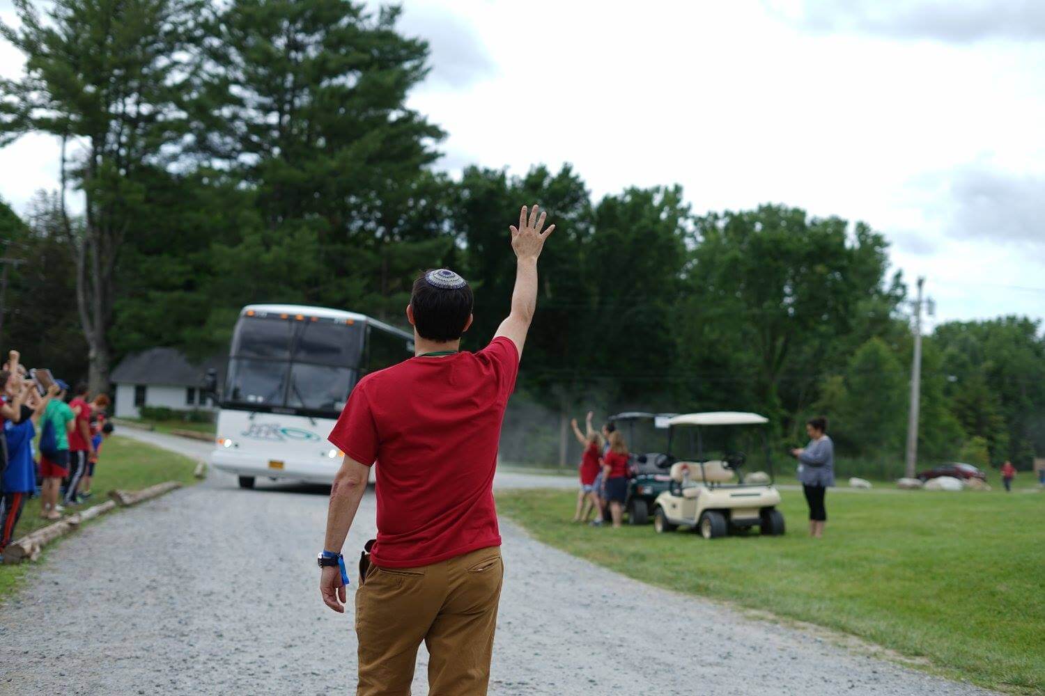 Rabbi Ethan Linden, pictured here welcoming campers to Ramah Berkshires in 2017, resigned as camp director before the institution settled a lawsuit alleging Linden and others mishandled a sexual assault report.