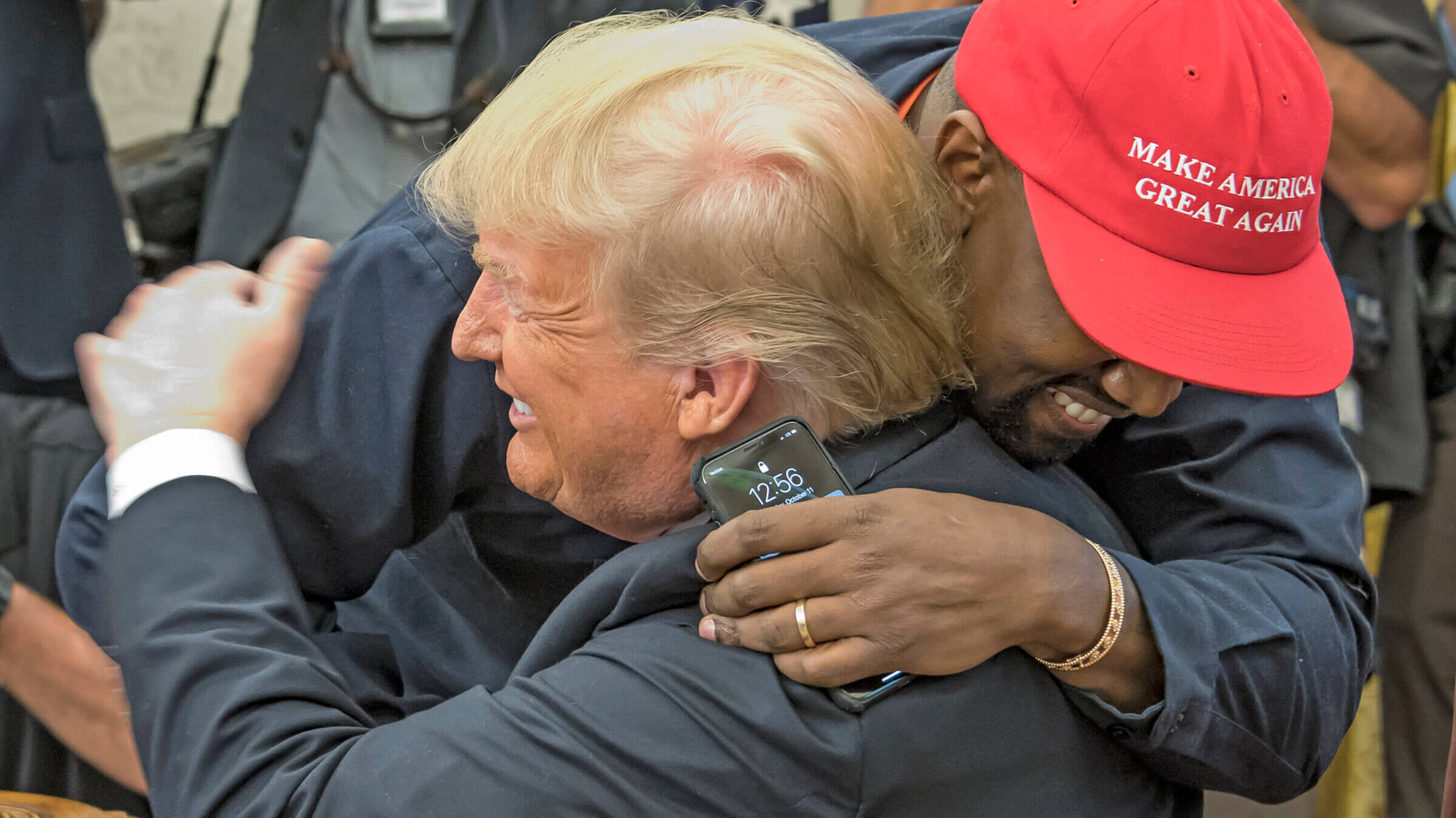 Kanye West embraces  Donald Trump in the White House's Oval Office in 2018.