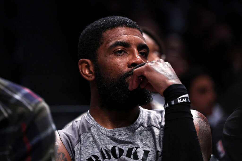 Kyrie Irving looks on from the bench Nov. 1. Irving has come under fire for tweeting a link to an antisemitic movie and refusing to apologize.