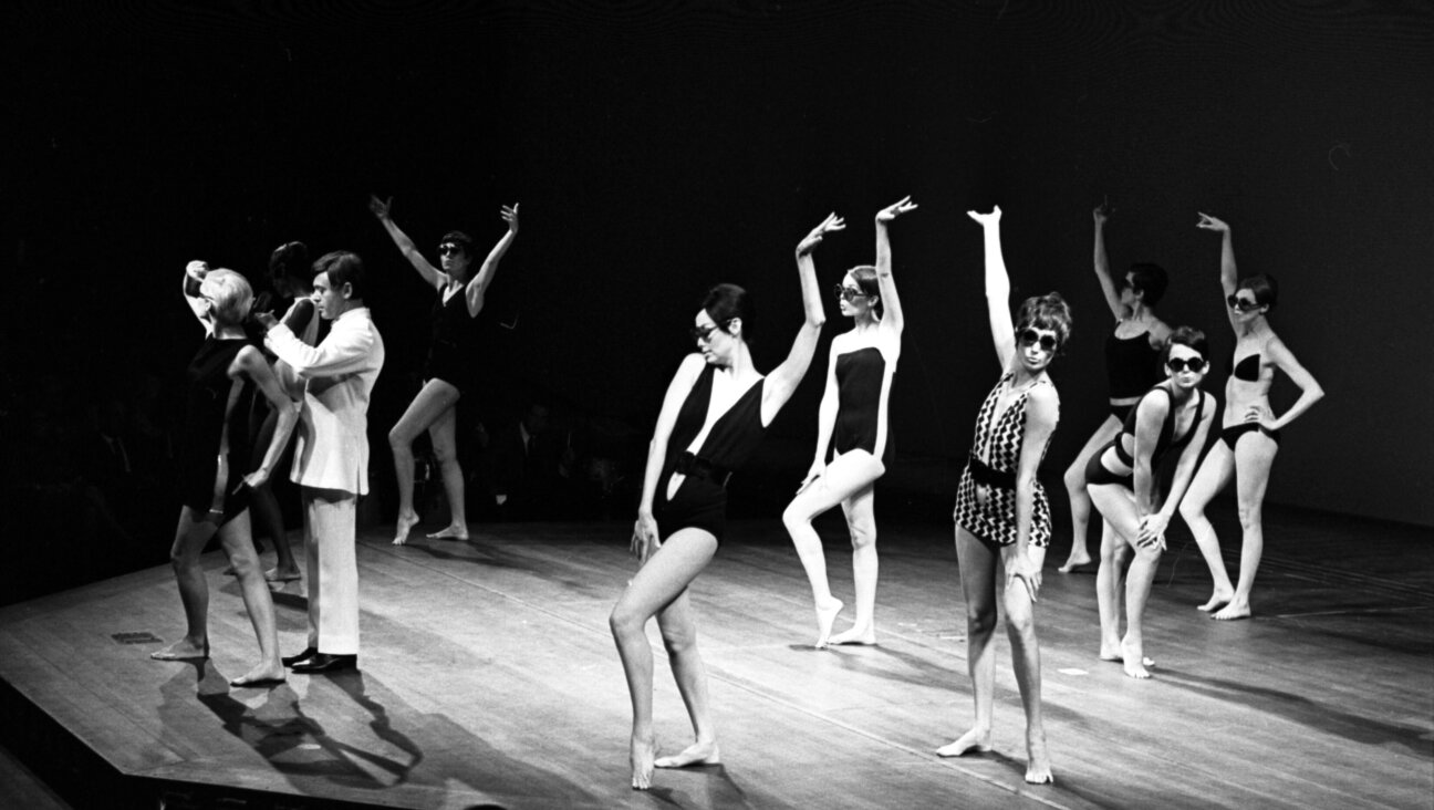 Rudi Gernreich and models of his swimwear attend a 1968 fashion event in LA.