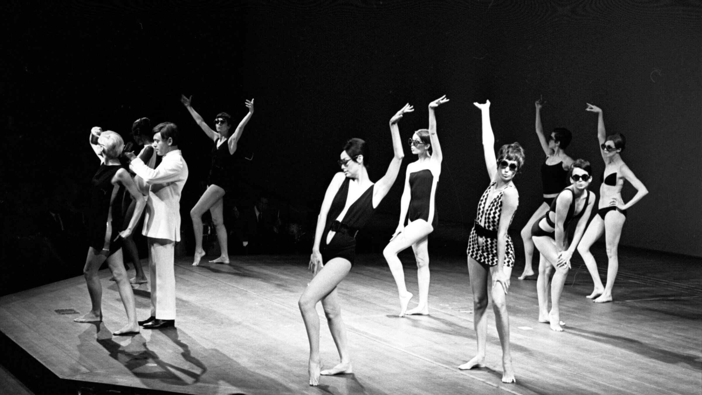 Rudi Gernreich and models of his swimwear attend a 1968 fashion event in LA.