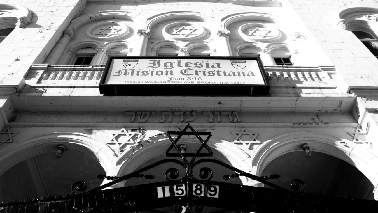 The former synagague Beth Hamedrash Hagadol on E. 172nd St. in the Bronx is now a church. This photo is part of the exhibit “Remnants of the Jewish Bronx” from Julian Voloj, which is on view in the Henry S. Miller Judaica Research room at Fordham University. (Julian Voloj)