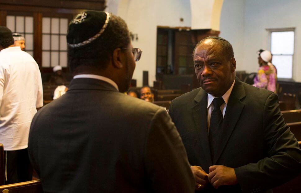 Rabbi Capers Funnye (right) leads Beth Shalom B'Nai Zaken, an Israelite congregation in Chicago he described as "Conservadox."