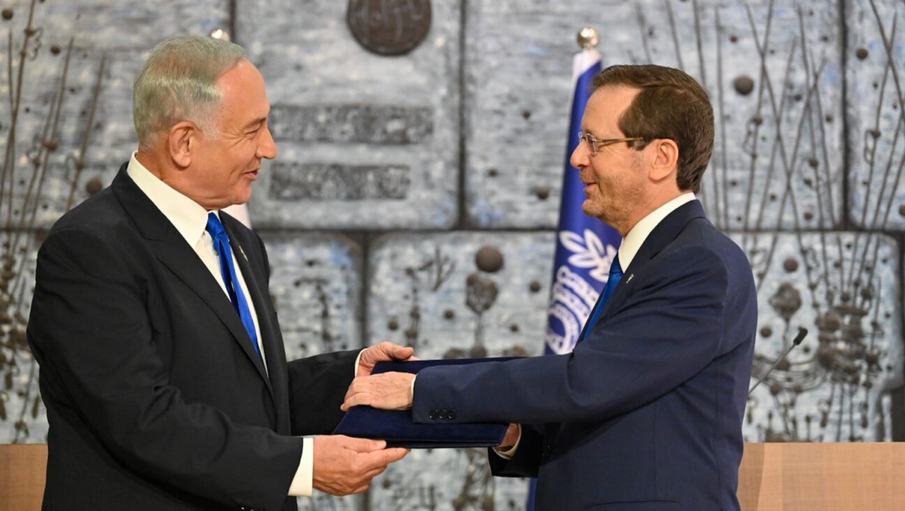 President Isaac Herzog tasking incoming Prime Minister Benjamin Netanyahu to form a new government in November, 2022.