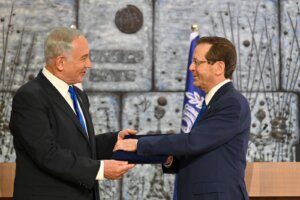 President Isaac Herzog tasking incoming Prime Minister Benjamin Netanyahu to form a new government in November, 2022.