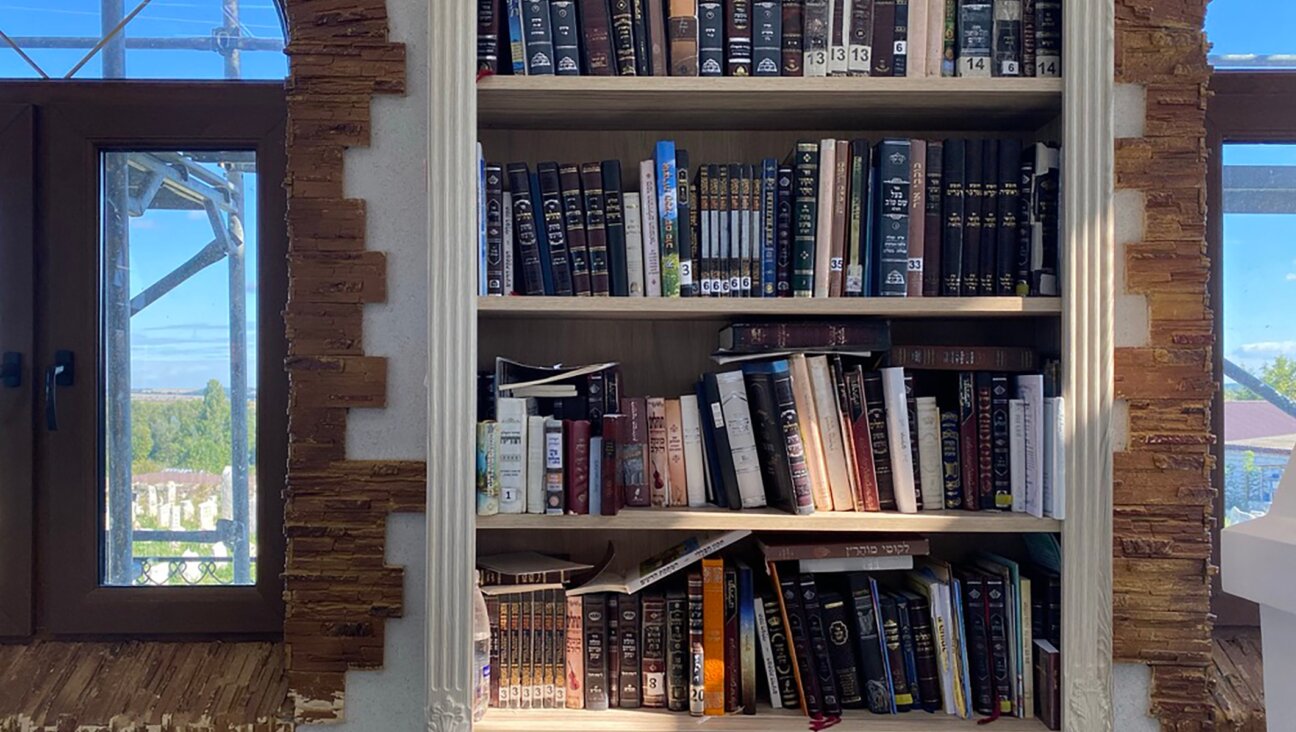 A bookshelf at Medzhybizh with texts in both Hebrew and Russian. (Jacob Judah)